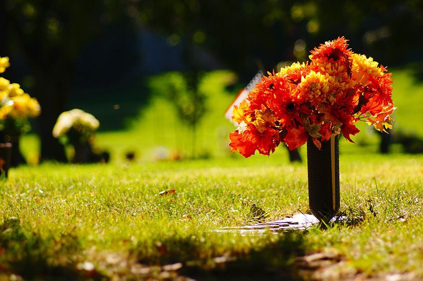 How can a church or synagogue purchase burial space for their members?