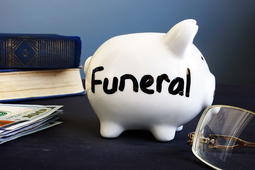 What are the payment options for burial or cremation spaces?